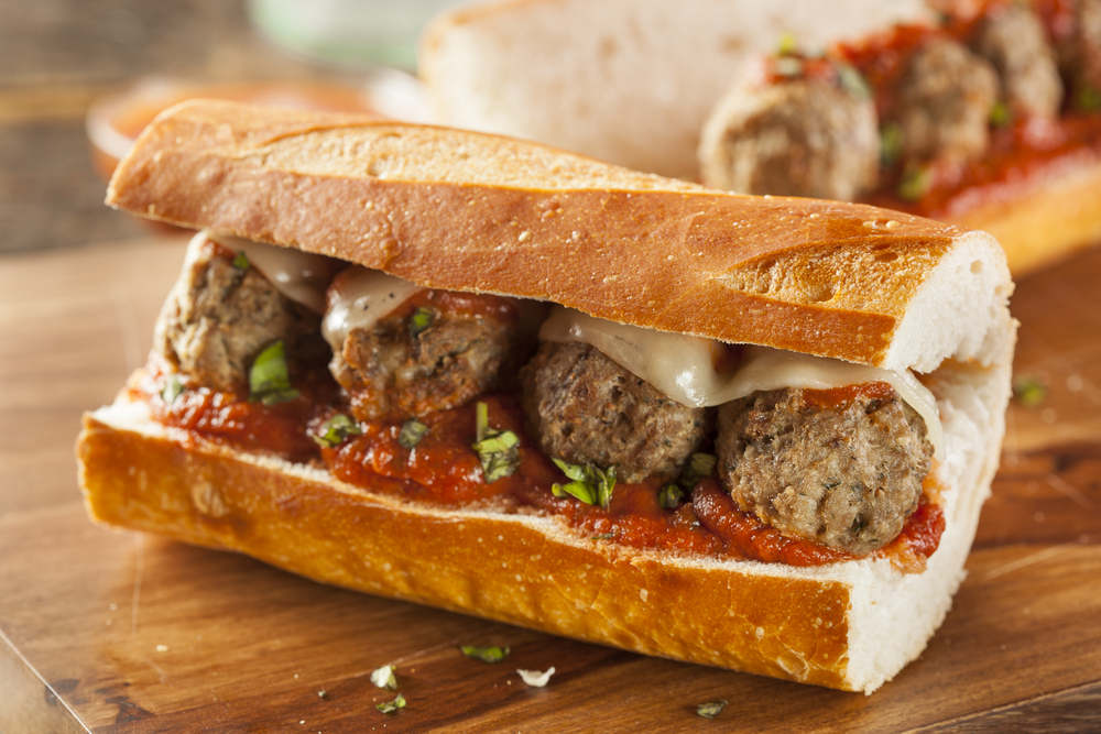 Homemade,Spicy,Meatball,Sub,Sandwich,With,Marinara,Sauce,And,Cheese