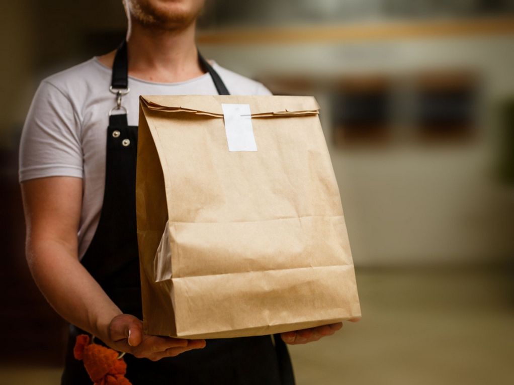 Man delivering food - Italian Food Delivered to Your Door